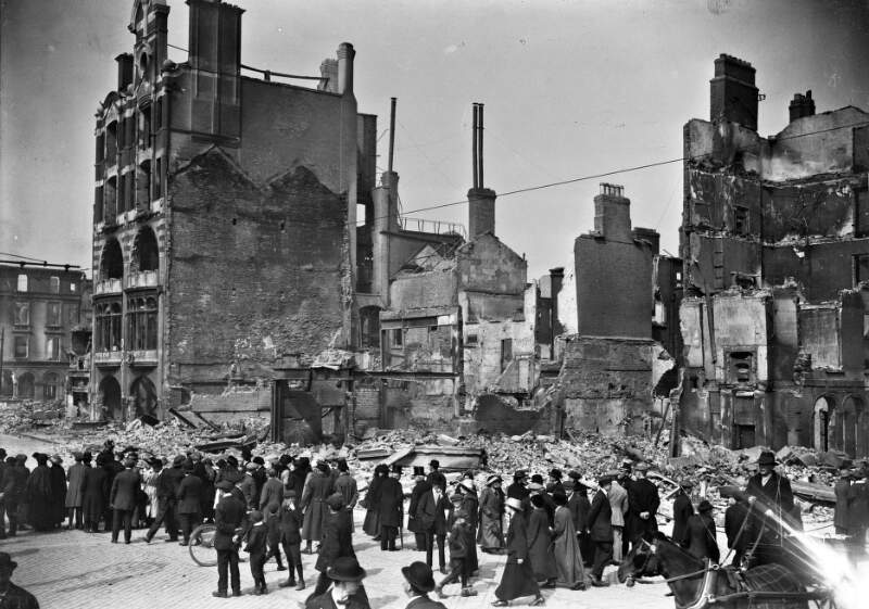 [Abbey Street corner and remains of the Dublin Bread Company building at 6-7 Lower Sackville Street after the Easter Rising]