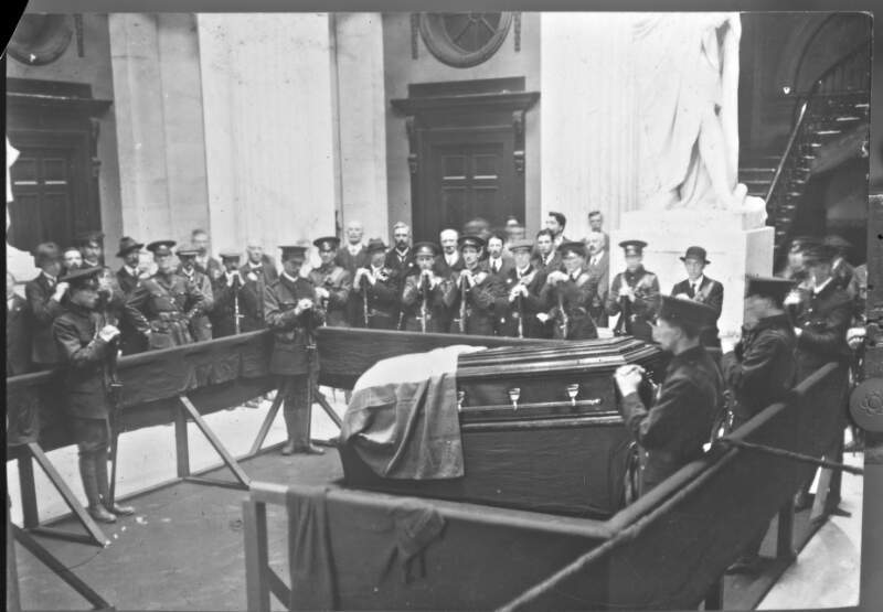 [Funeral of O'Donovan Rossa, lying-in-state in the City Hall, tricolour on coffin, guard of honour]