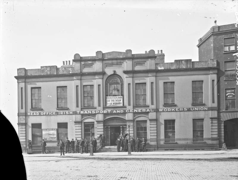 [Head Office Irish Transport and General Workers' Union, banner "Working stealing Begging, there are only three ways of living if so read the Irish Worker, the only labour paper in Ireland" and advertisement on Building, "Clyde Shipping Co. coasting tours"]