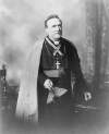 [Rev. O'Sullivan, clergyman, full-length portrait]