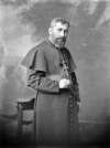 [Bishop Jacques Manna standing, three-quarter length portrait]