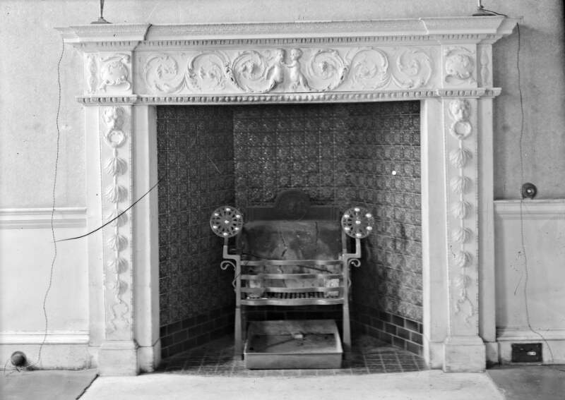 [Fireplace with angel-like figures on mantle, lions heads, Ely House, Dublin]
