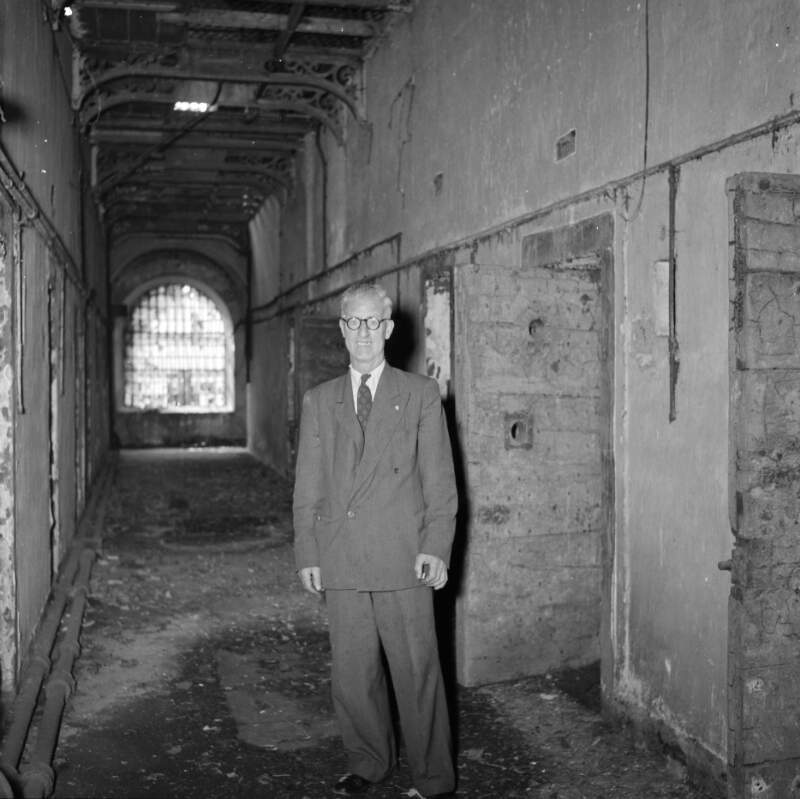 [Man by cell door, Kilmainham Gaol, Dublin]
