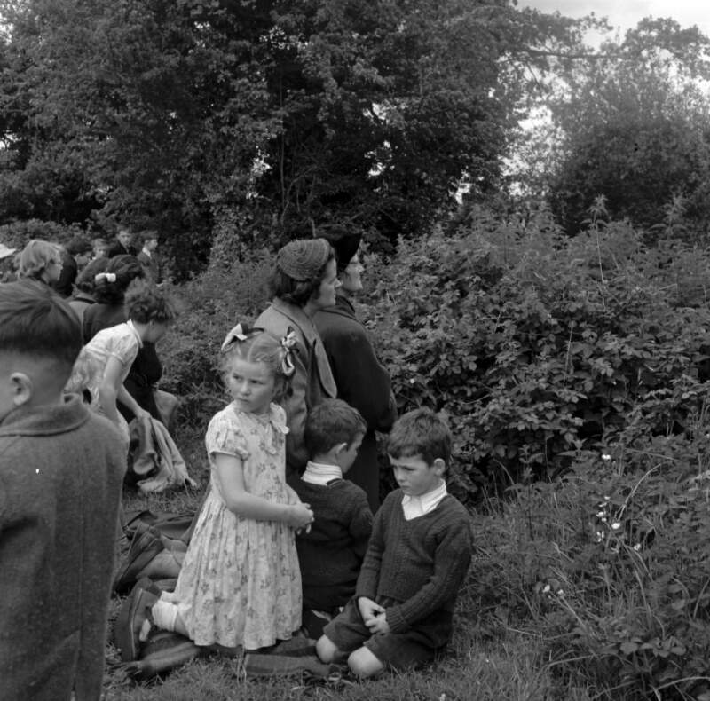 [Women and children praying at St. Columcille's Well, Ballycullen, Rathfarnham, Co. Dublin]