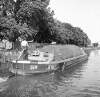 [Man steering barge on Grand Canal, Portobello/Ballsbridge, Dublin]