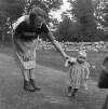 [Woman and toddler at Sheridan/O'Brien campsite, Loughrea, Co. Galway]