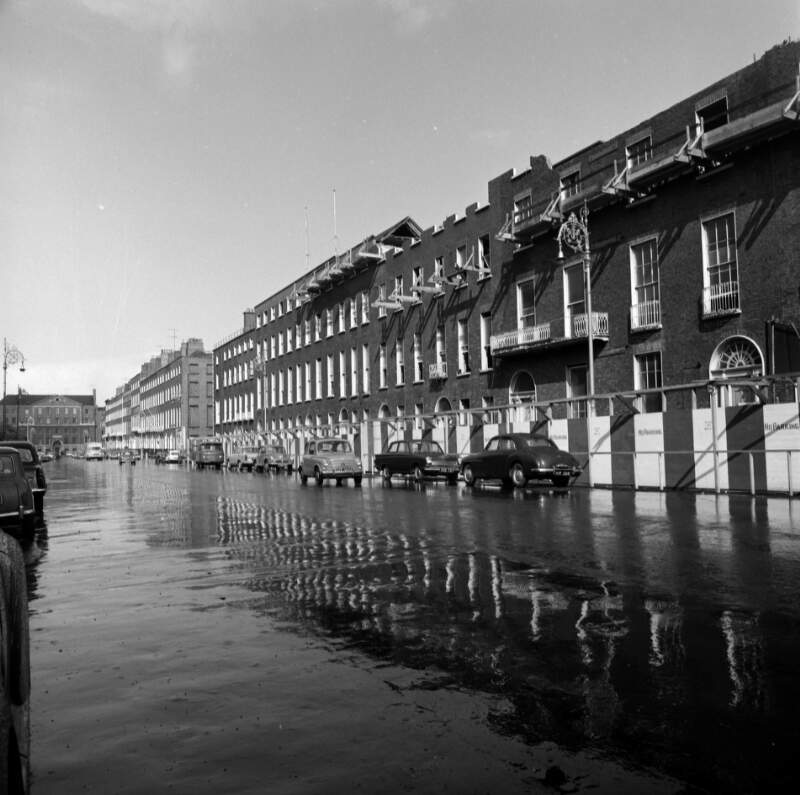[Row of houses behind hoardings, Fitzwilliam Street Lower, Dublin]
