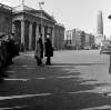 [Guards with crowd near G.P.O, half-demolished Nelson Pillar in background, O'Connell Street, Dublin]