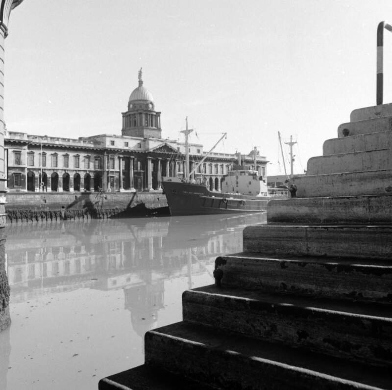[Ship moored at Custom House, base of bridge and steps in view, Dublin]