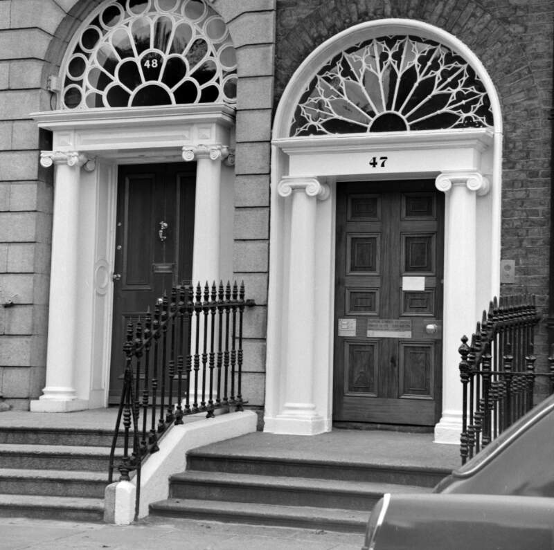 [Georgian doorways with ornate fanlights, Upper Leeson Street, Dublin]