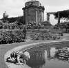 [Little boy playing by pond, cenotaph in background, National War Memorial Park, Islandbridge, Dublin]
