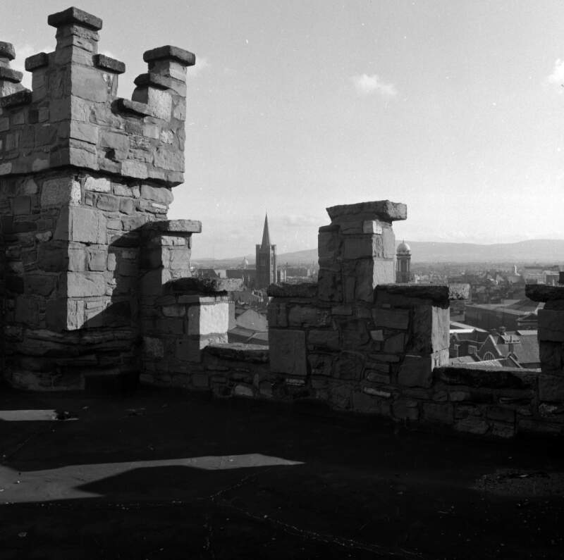 [View of Dublin through battlements of St. Audoen's Tower, Cornmarket, Dublin]
