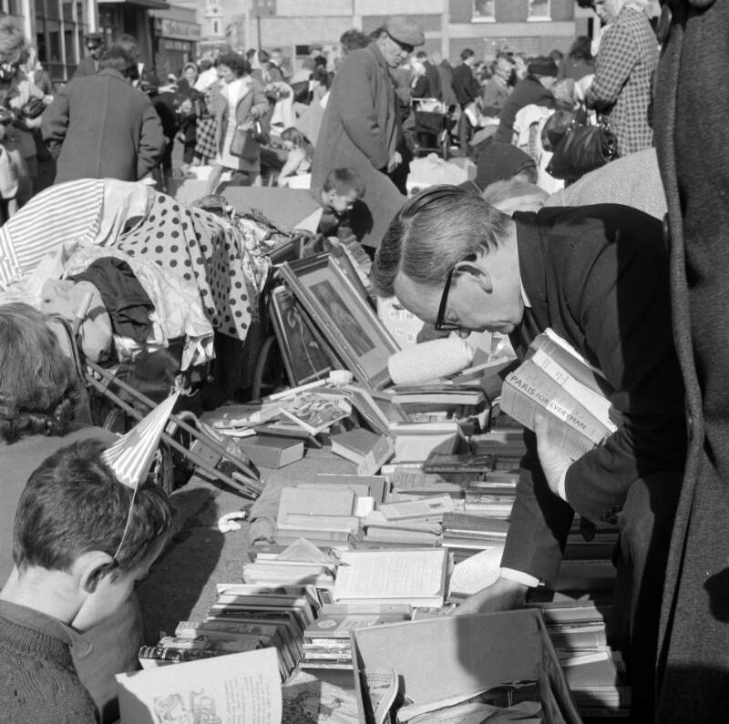 [People browsing at bookstall, Cumberland Street Market, Dublin]
