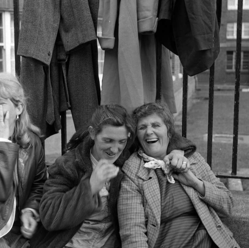 [Women laughing, Cumberland Street Market, Dublin]