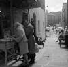 [Couple browsing through books outside shop, Merchant's Arch, Temple Bar, Dublin]