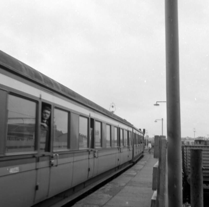 [Man looking out of train, Heuston (Kingsbridge Station), Dublin]