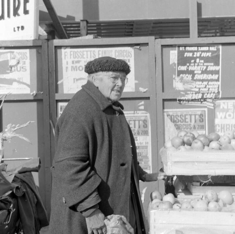 [Old woman selling fruit at stall, Heuston (Kingsbridge Station), Dublin]