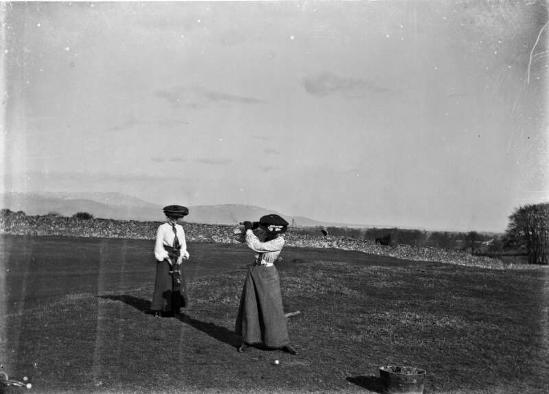[Two ladies playing golf on Golf Links, Ireland]