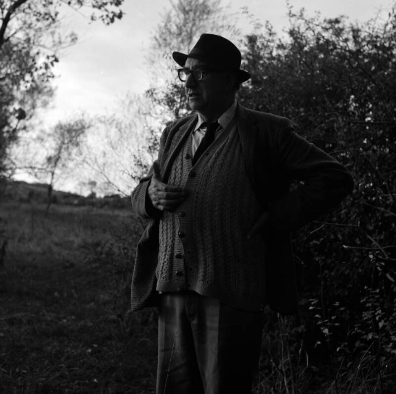 [Patrick Kavanagh standing in field, Inniskeen, Co. Monaghan]