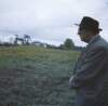 [Patrick Kavanagh standing in field, Inniskeen, Co. Monaghan]
