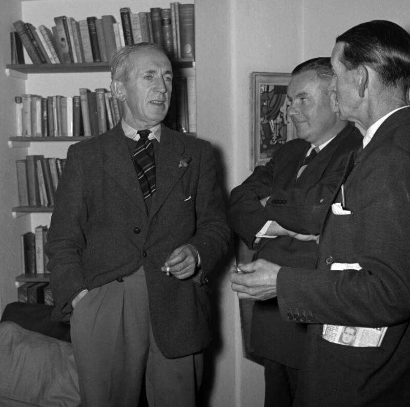 [Tom Joyce and two unidentified men at Michael Scott's house, Sandycove, Co. Dublin]