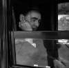 [Flann O'Brien looking out carriage window, Bloomsday, Co. Dublin]