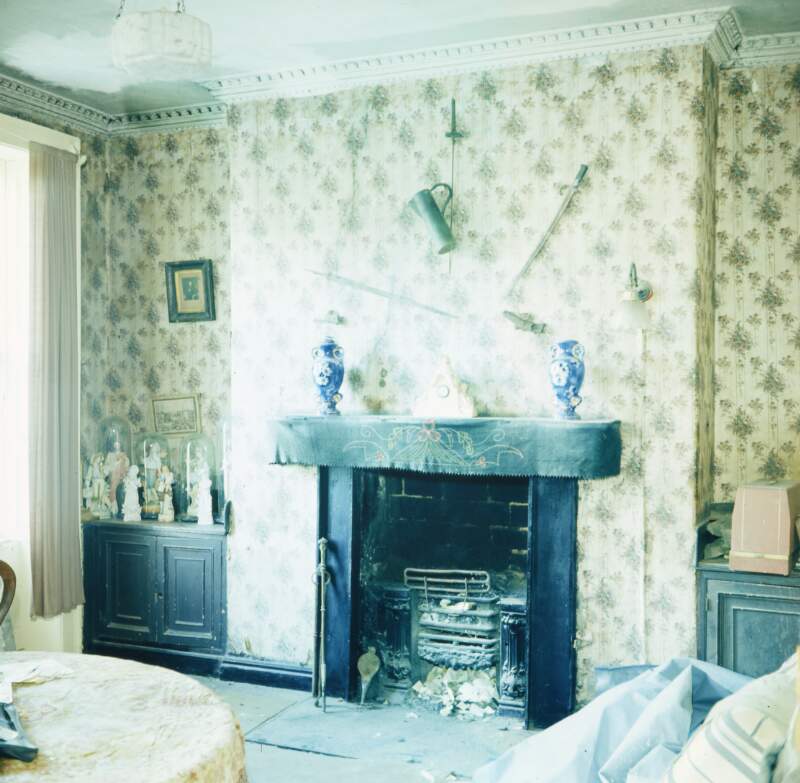 [Sean O'Casey's room, showing fireplace and religious statues, 422 North Circular Road, Dublin]