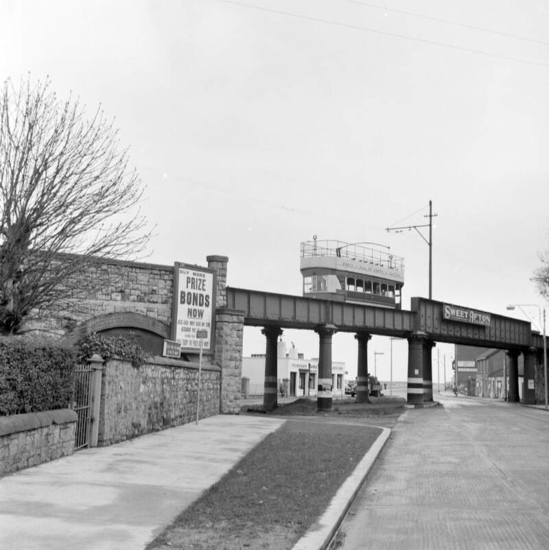 [Tram crossing over elevated road bridge, Howth, Co. Dublin]