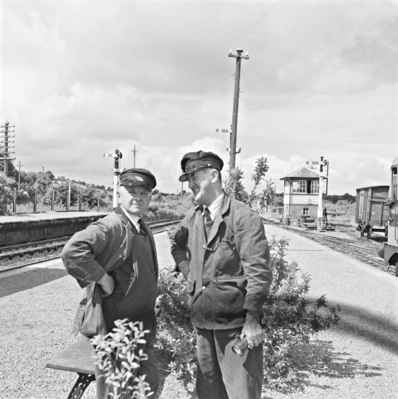 [Jim Horgan and F. Gravey standing on the platform at Banteer railway station, Co. Cork]