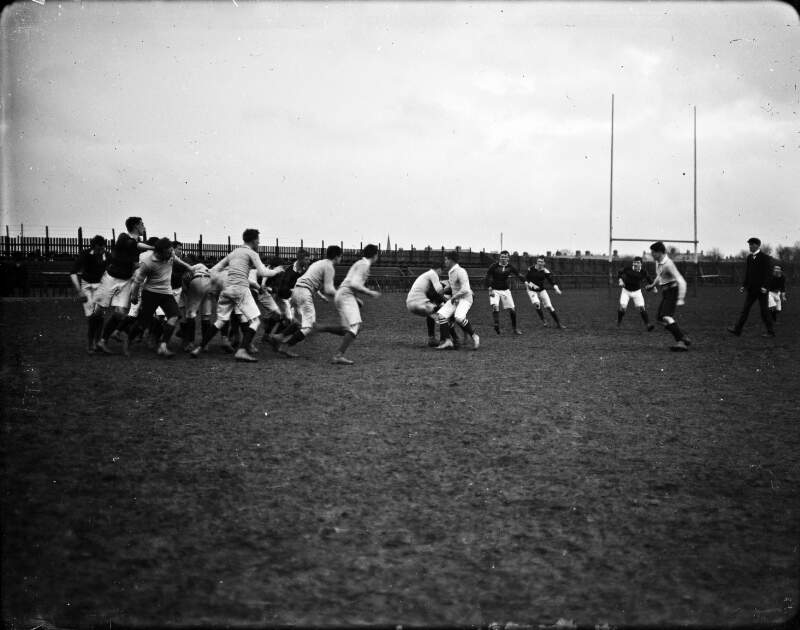 [Two teams playing a rugby match]