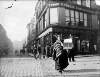 [Woman with birdcage at junction of Grafton Street and South King Street]