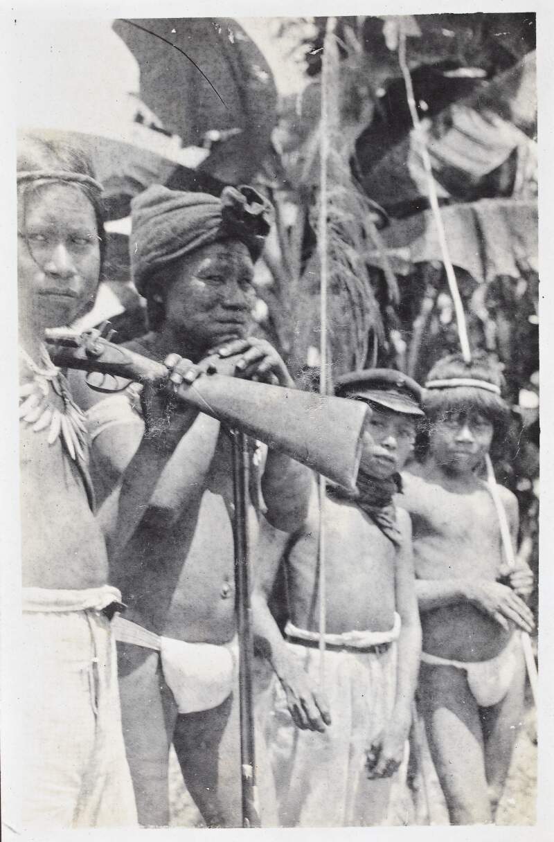 [Two men and two boys from the Putumayo region]
