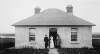 [Lord and Lady Aberdeen with nurse, outside house at Geesala, Ballina, Co.Mayo]