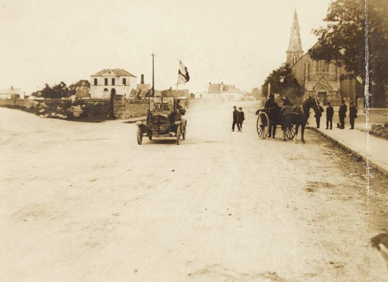 [Red Cross car passing through a village at the South Western Front during the Irish Civil War]