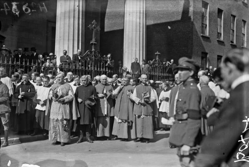 [Clergy gathered outside the Pro-Cathedral for the funeral of Michael Collins]