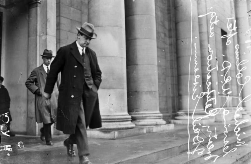 [Michael Collins leaving Earlsfort Terrace with Luke Patrick Smith after the Treaty ratification meeting]