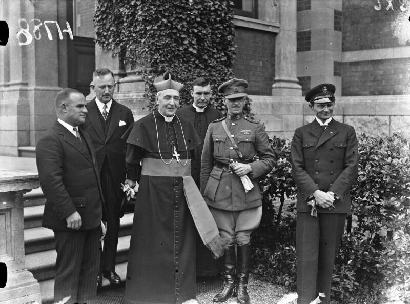 [Bremen crew: Capt. Herman Köhl, Baron Gunther Von Hünefeld and Capt. James Fitzmaurice with the Archbishop of Dublin, Most Rev. Edward J. Byrne]