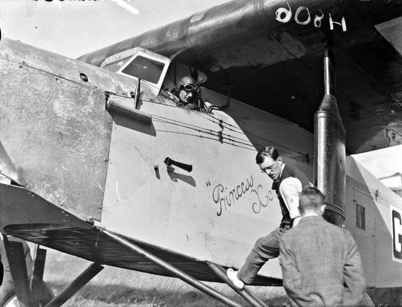 [Fokker monoplane, the "Princess Xenia" at Baldonnel. Plane on ground, pilot in cockpit.]