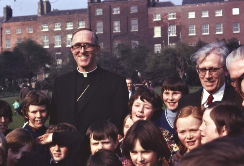[Crowd surrounding Dermot J Ryan, Catholic Archbishop of Dublin, in Merrion Square, Dublin]