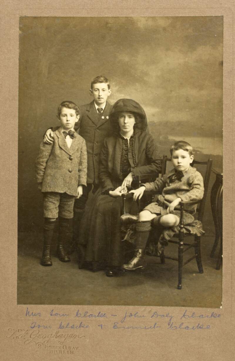 [Group portrait of Kathleen Clarke in mourning clothes and her sons John Daly Clarke, Tom Clarke and Emmet Clarke, taken in the aftermath of the execution of her husband Tom Clarke in 1916]