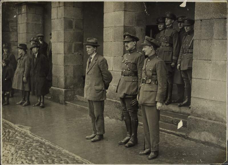 [Trooping of colours at Beggars Bush Barracks: General Richard Mulcahy on the extreme left, Major General O'Connell in the centre with General Ennis on the right]