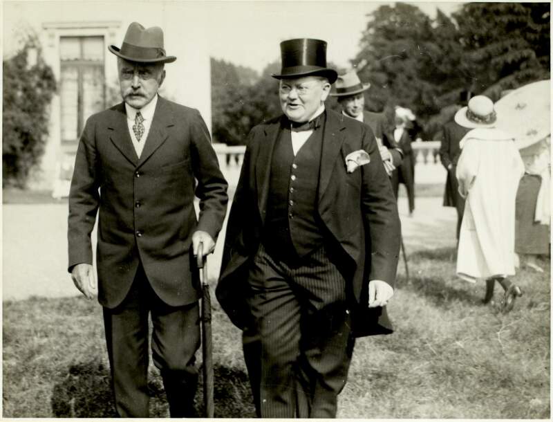 [Hugh Kennedy, in top hat, with Lord Glenavy, pictured in the garden of Kennedy's house in Newstead, Clonskeagh, Dublin]