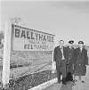 Group of 3 workers beside nameboard, Ballyhaise, Co. Cavan.