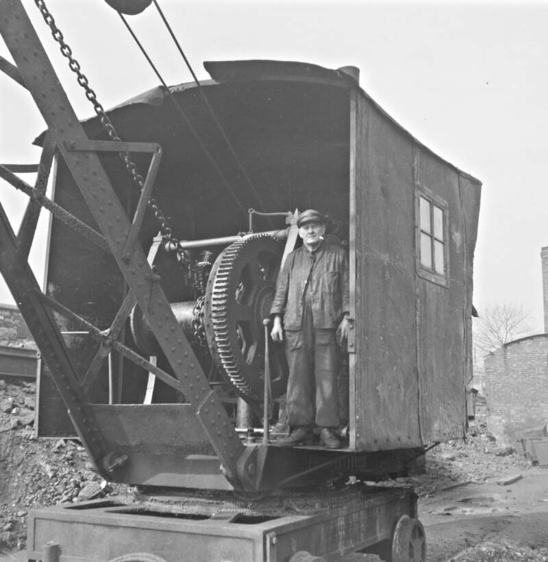 Crane & worker, Broadstone, Co. Dublin.