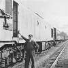 Driver, Kit Duffy beside train, Westport, Co. Mayo.