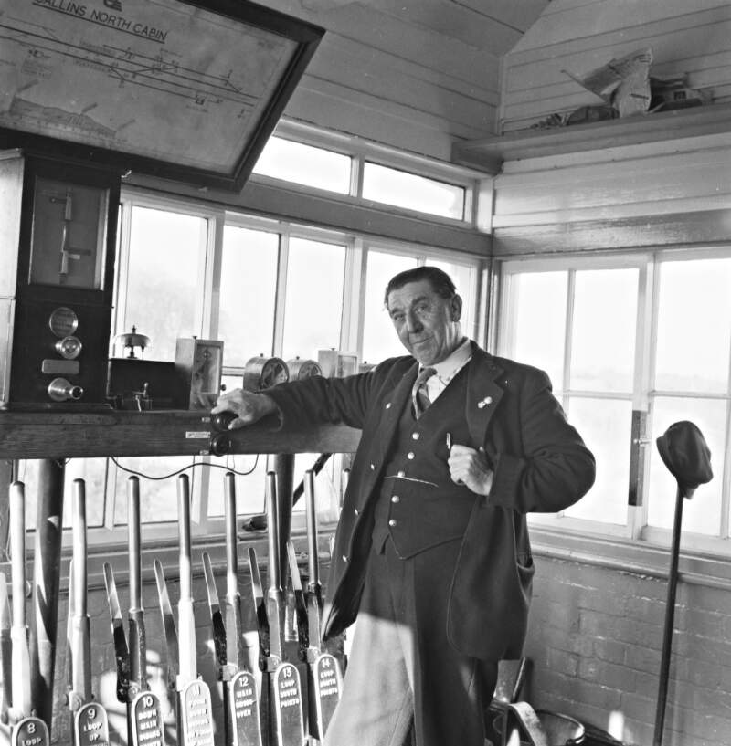 Harry Crosby beside signalling frame, Sallins, Co. Kildare.