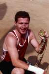 [Boxer Michael Carruth displays his gold medal from the Barcelona Olympic Games]