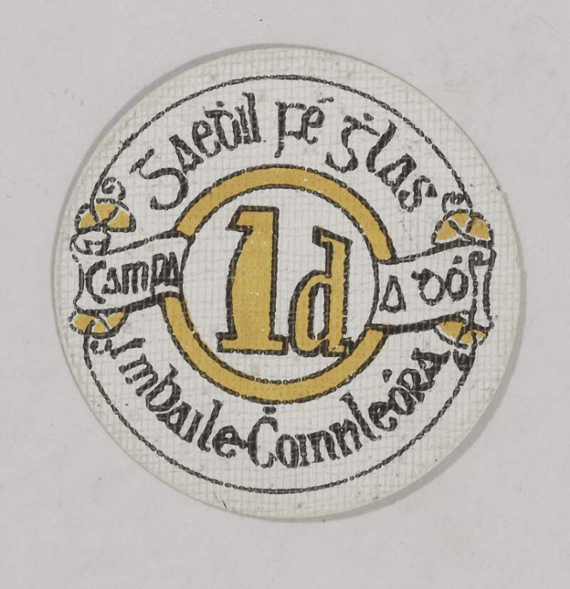 [Badge with the words "Gaedhil fé ghlas 1d : campa a dó, i mBaile Coinnleóra" printed on it]