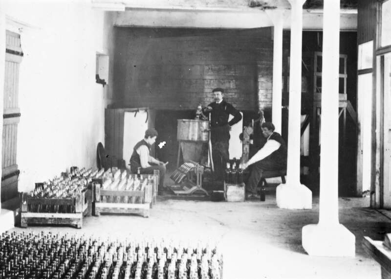 Persse & Co Galway. Bottling Store: 3 men at work.