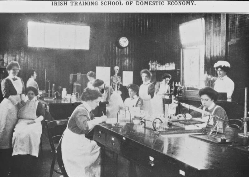 Irish Training School of Domestic Economy: all women, aura scientific: skeleton, first aid, mortar/pestle lab-like setting.